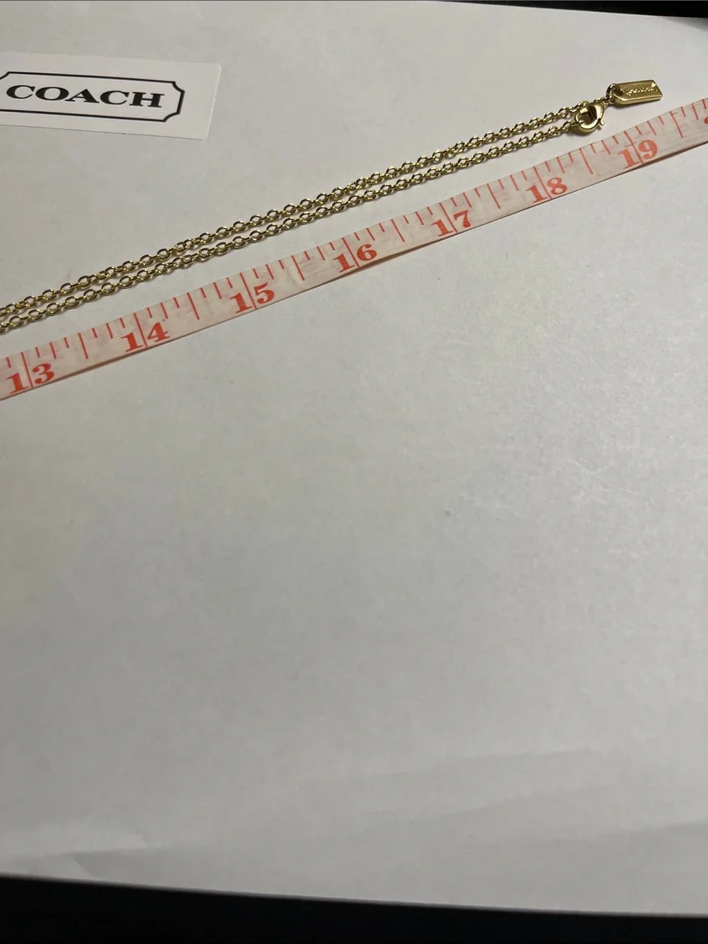 Coach Gold Pendant Necklace with Triple Medallion Reversible Charms